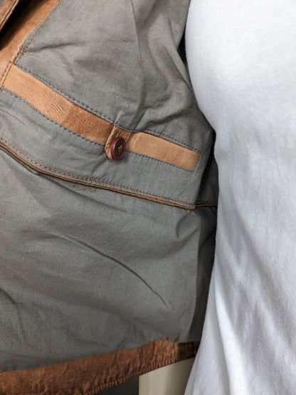 Maddox dubbelzijdig leren gilet met 3 binnenzakken. Bruin. Maat M.