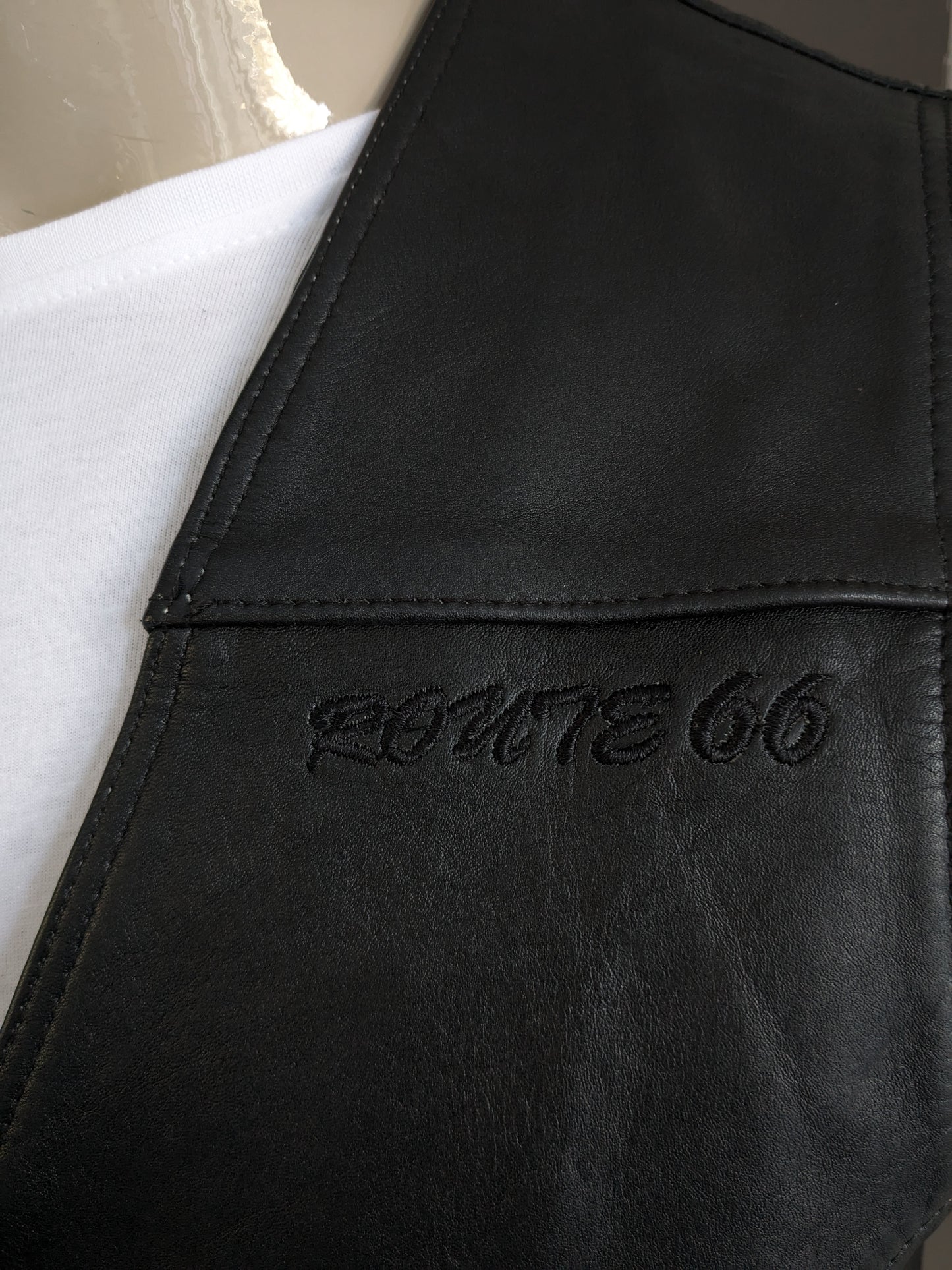 Origineel Route 66 dubbelzijdig leren gilet met drukknopen. Zwart. Maat M / L.