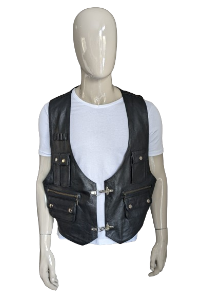 Vintage mom fashion double -sided leather waistcoat with lots of bags and buckles. Black. Size XL.