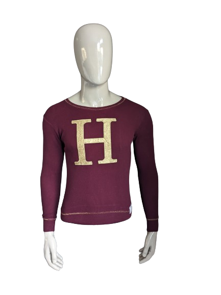 Harry Potter longsleeve. Bordeaux goudkleurig. Hogwarts school. Maat S.