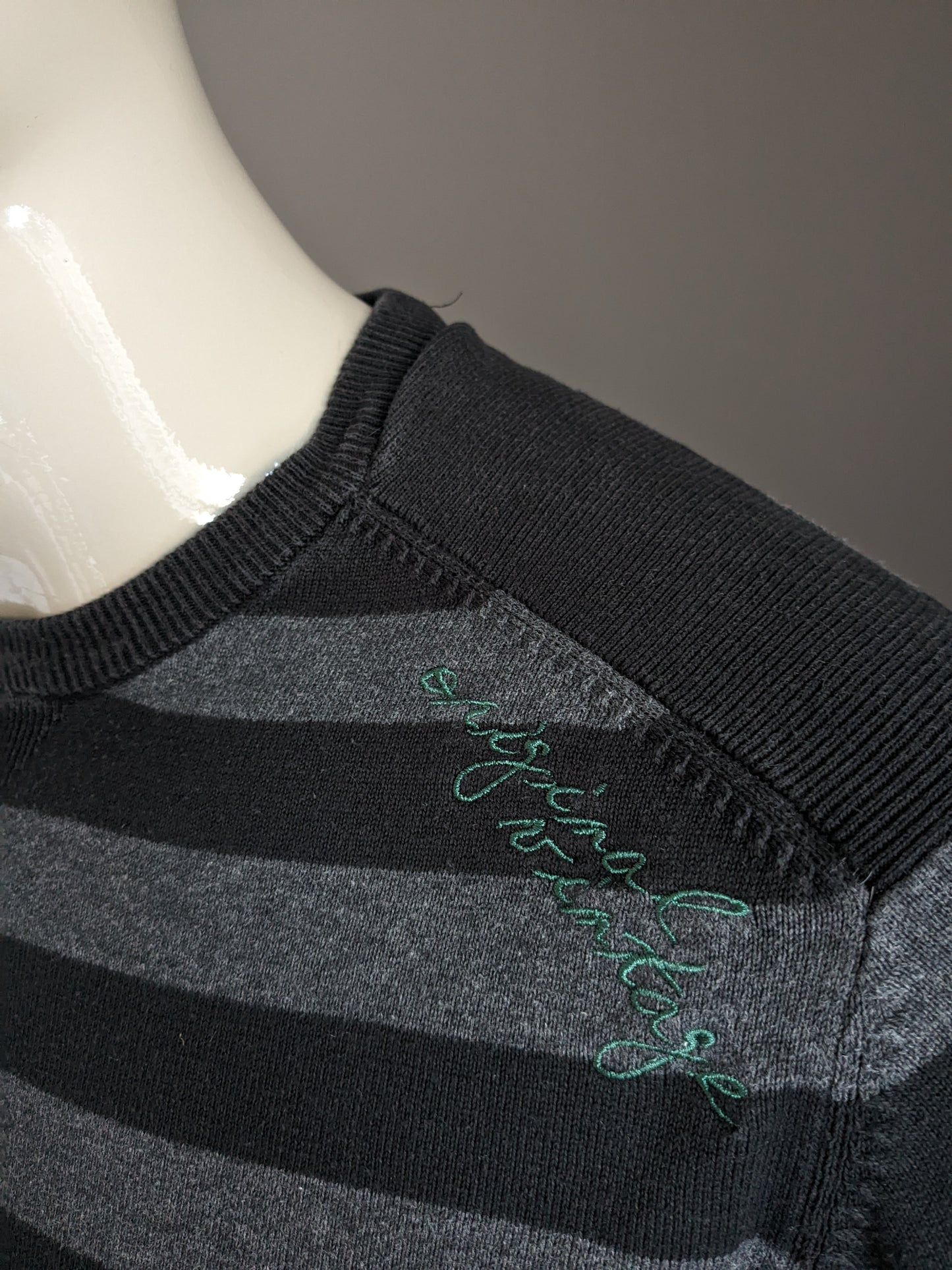 Manguun casual sweater with elbow patches. Black gray striped. Size XL.