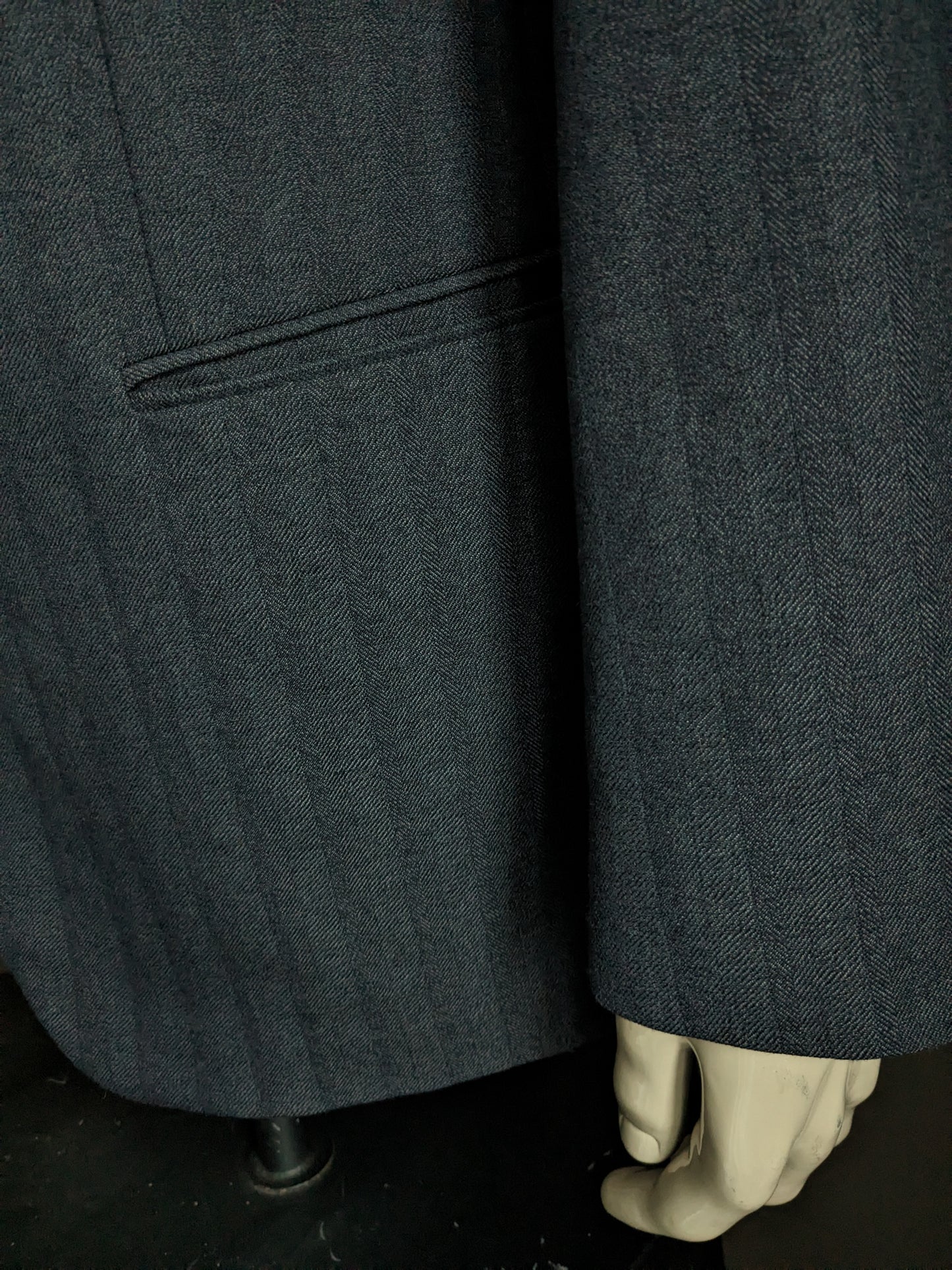 Giacca di lana Varteks. Motivo a spina di pesce nero grigio. Taglia 56 / XL. 45% lana.