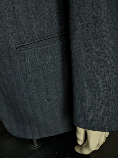 Veste en laine Varteks. Motif chevrons gris noir. Taille 56/XL. 45% laine.