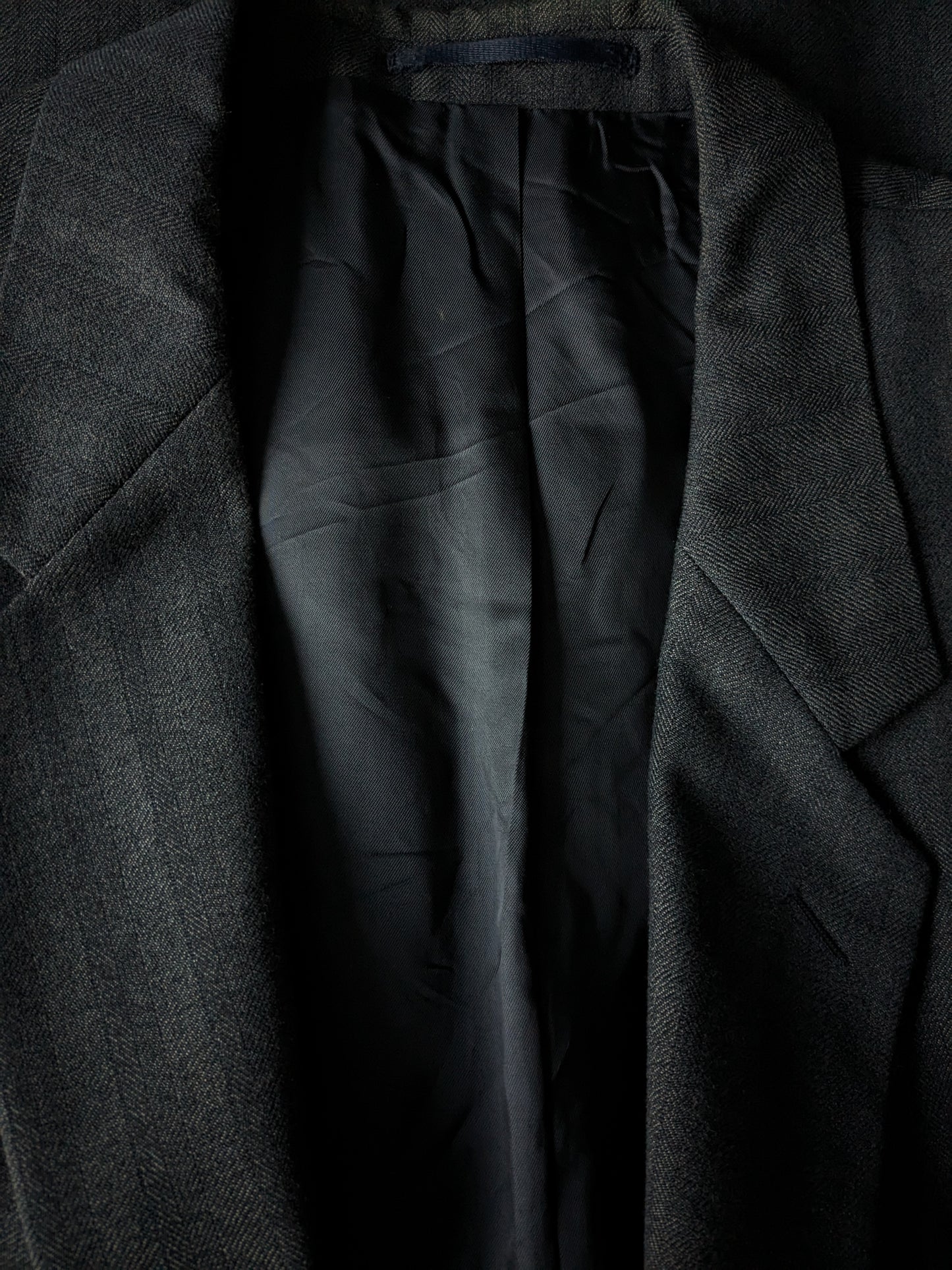 Giacca di lana Varteks. Motivo a spina di pesce nero grigio. Taglia 56 / XL. 45% lana.