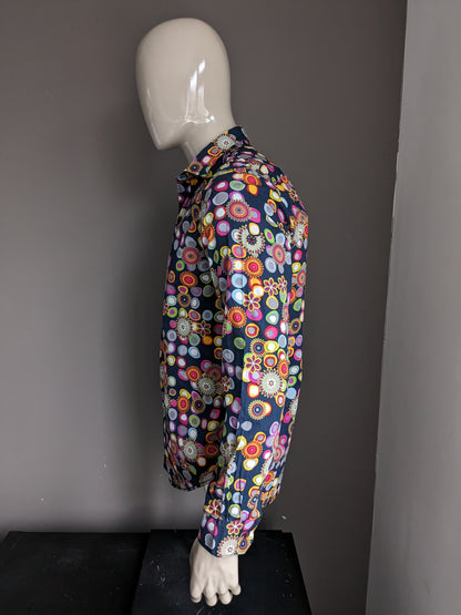 Desigual-Shirt. Farbige Punkte und Blumendruck. Größe M.