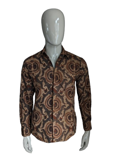 Batik Warda shirt. Lightly lined. Black Brown print. Size M.