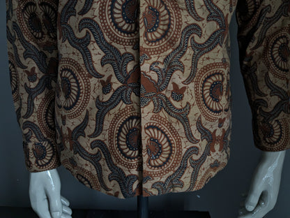Batik Warda shirt. Lightly lined. Black Brown print. Size M.