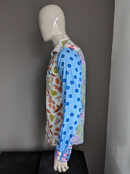 Chemise Desigual avec boutons pression. Imprimé Bleu Marron Rouge Vert. Taille M.