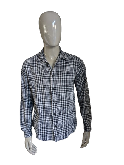 Camisa de humo. Cuadros en blanco y negro. Talla XL. Ajuste normal.