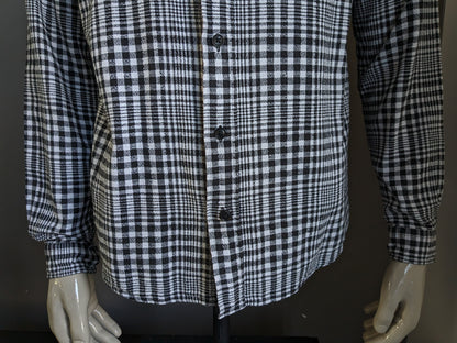Camisa de humo. Cuadros en blanco y negro. Talla XL. Ajuste normal.