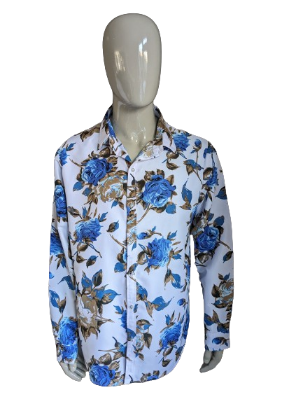 Chemise imprimée sans marque. Imprimé floral bleu marron. Taille XL.