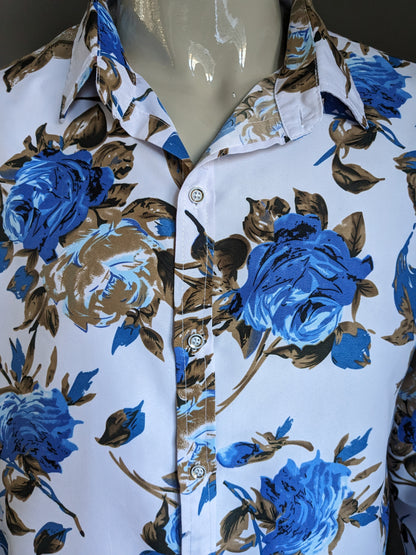 Chemise imprimée sans marque. Imprimé floral bleu marron. Taille XL.