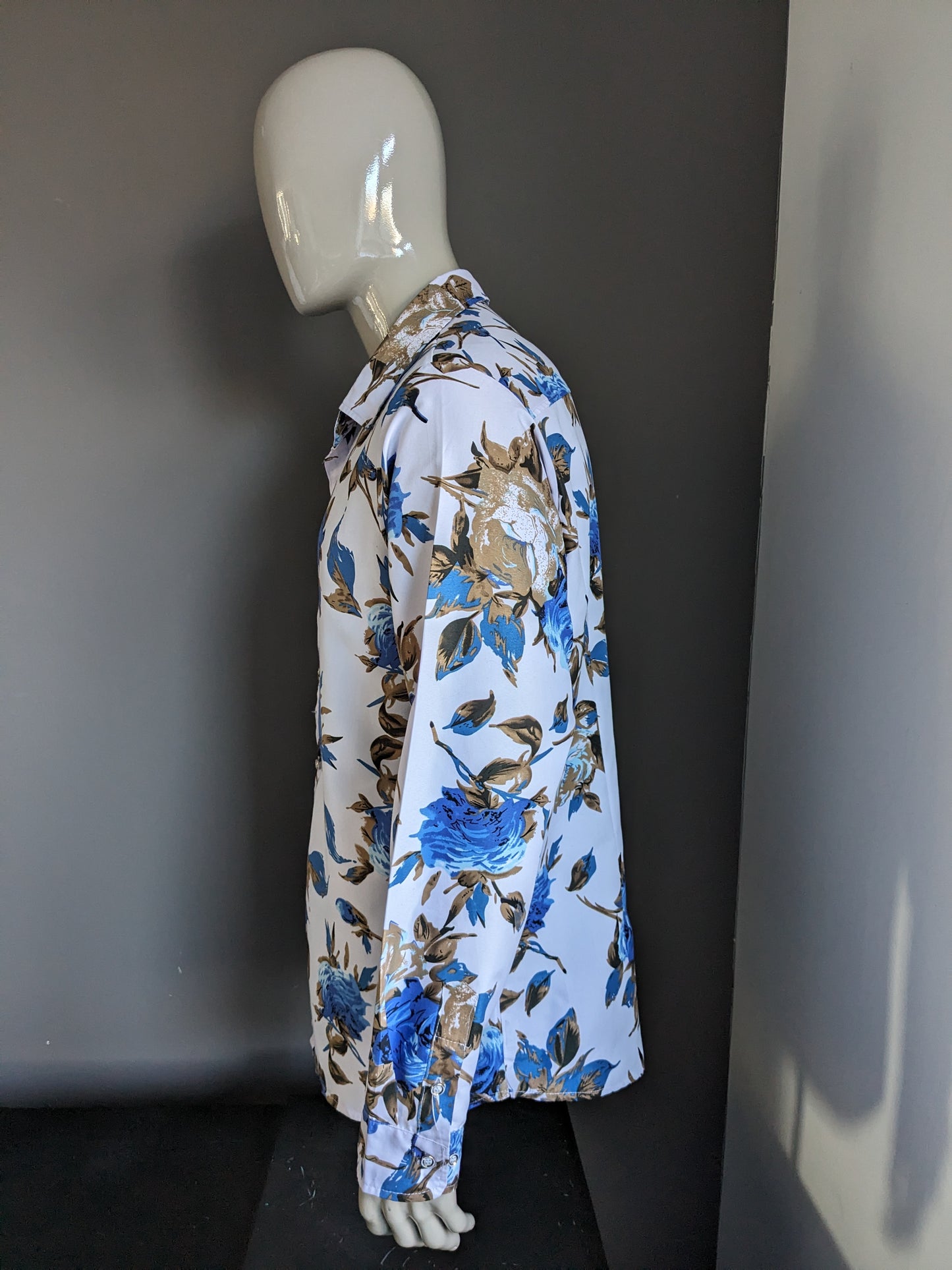 Chemise imprimée sans marque. Imprimé floral bleu marron. Taille XL.