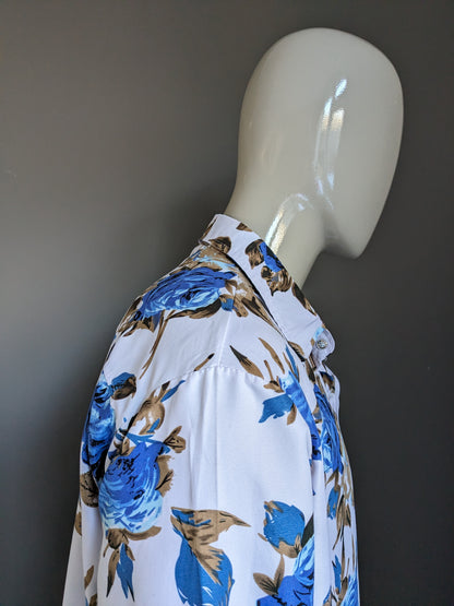 Chemise imprimée sans marque. Imprimé floral bleu marron. Taille XL.