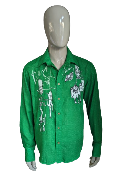 Desigual shirt. Green and white dotted with print. Size XL.