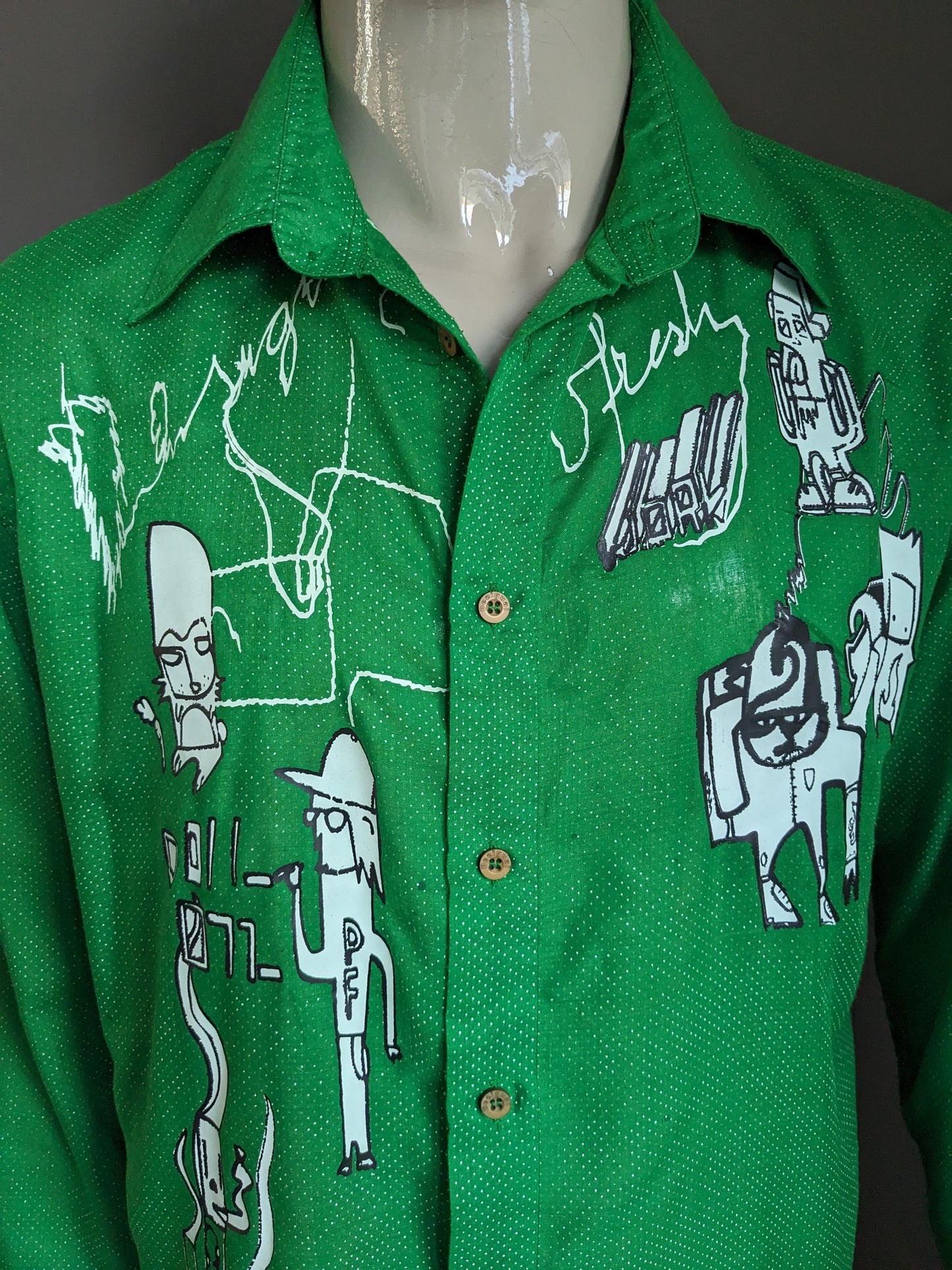 Desigual shirt. Green and white dotted with print. Size XL.
