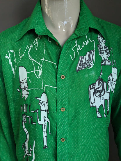 Desigual shirt. Green and white dotted with print. Size XL.