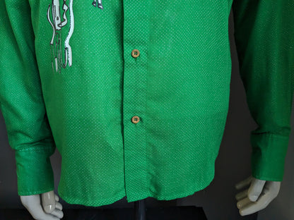 Desigual shirt. Green and white dotted with print. Size XL.
