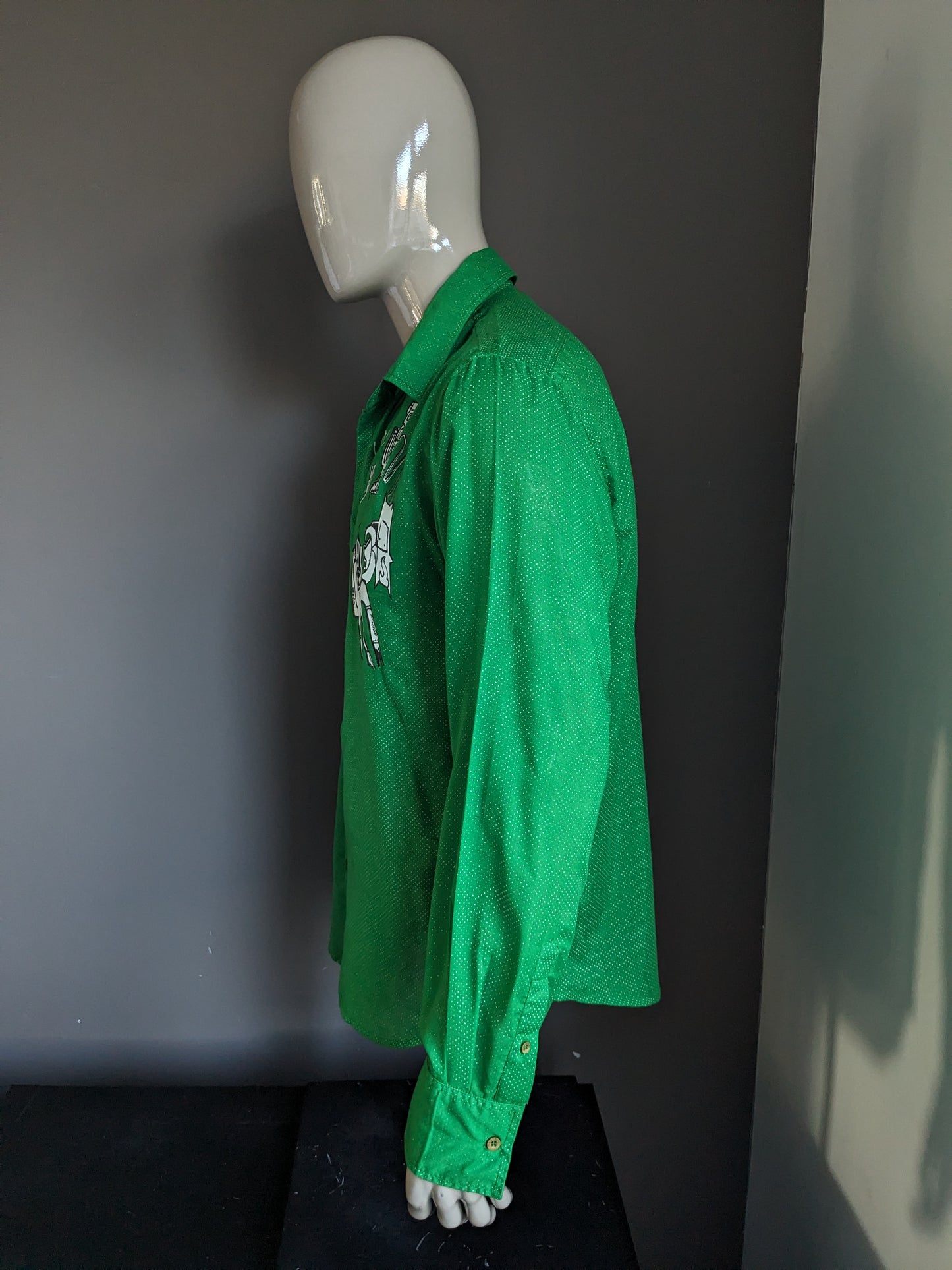 Desigual shirt. Green and white dotted with print. Size XL.