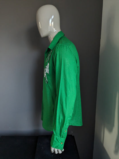 Desigual shirt. Green and white dotted with print. Size XL.