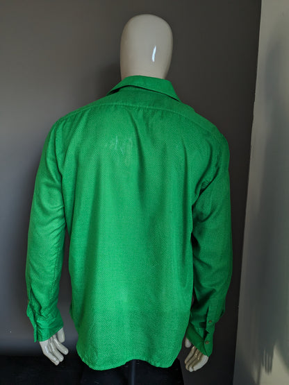 Desigual shirt. Green and white dotted with print. Size XL.