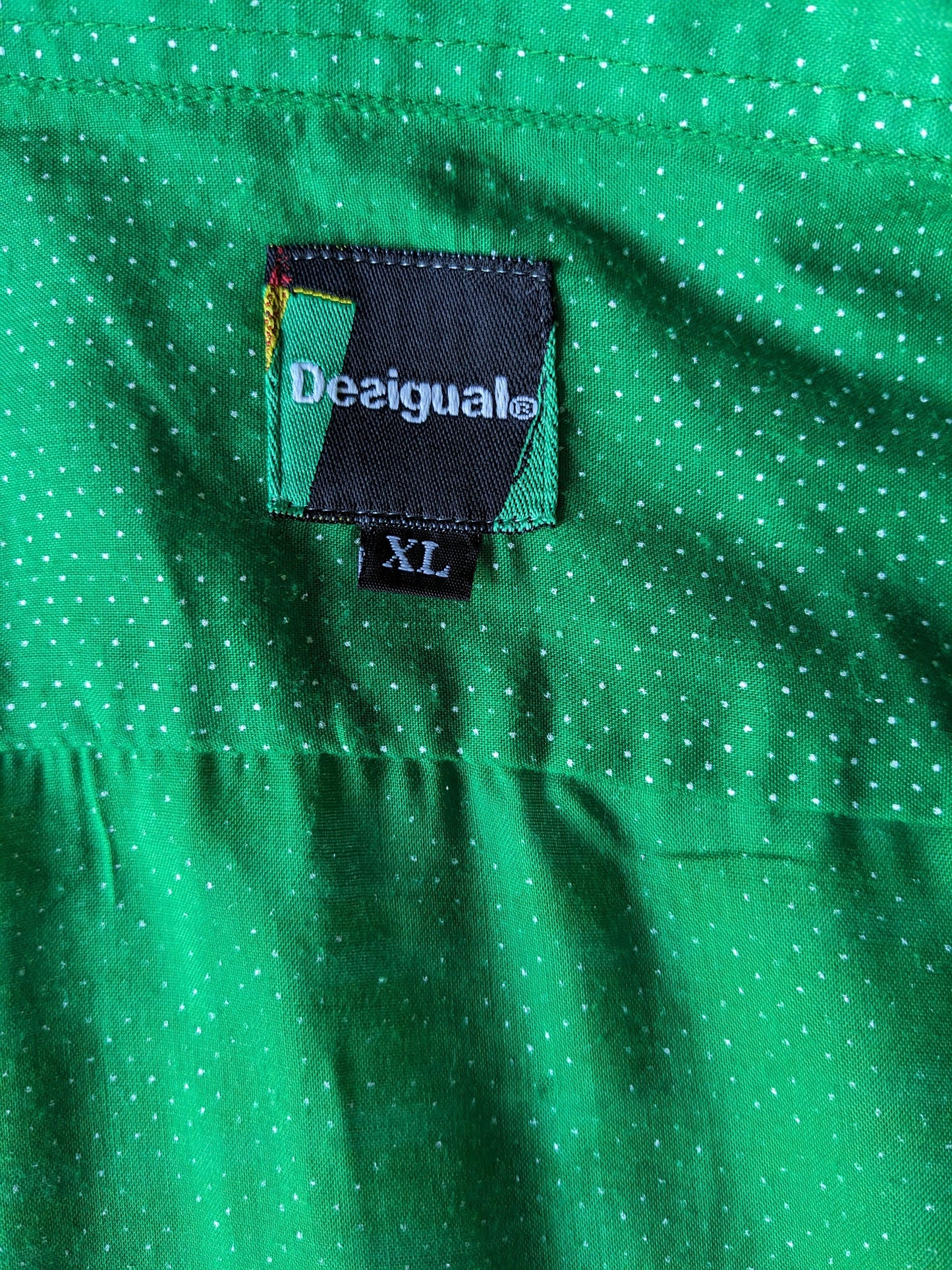 Desigual shirt. Green and white dotted with print. Size XL.