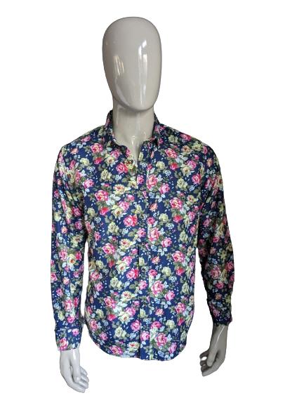 Camisa con estampado sin marca. Estampado floral azul rosa verde. Talla L.