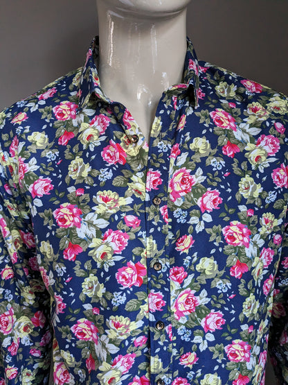 Camisa con estampado sin marca. Estampado floral azul rosa verde. Talla L.