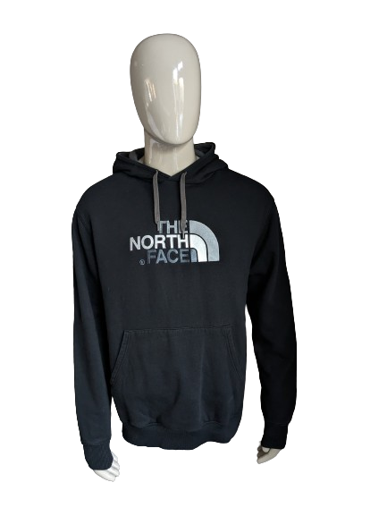 The North Face Hoodie. Black with print. Size L.