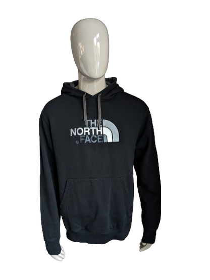 The North Face Hoodie. Black with print. Size L.