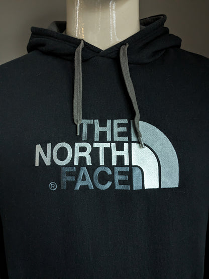 The North Face Hoodie. Black with print. Size L.