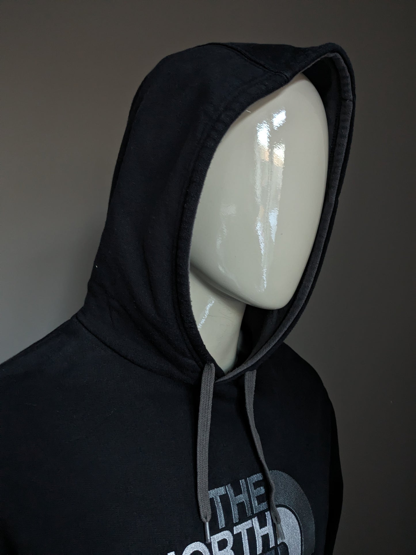 The North Face Hoodie. Black with print. Size L.