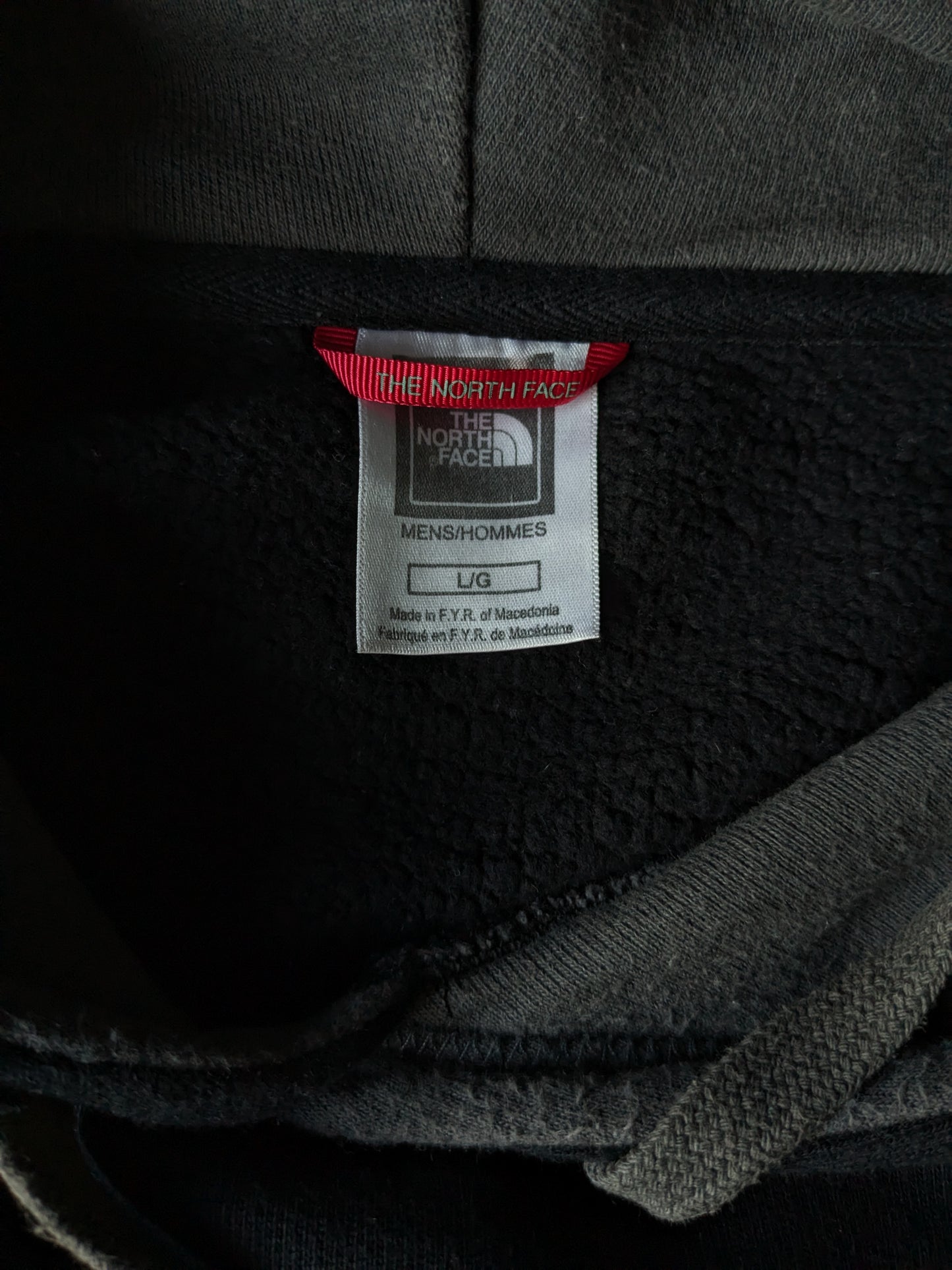 The North Face Hoodie. Black with print. Size L.