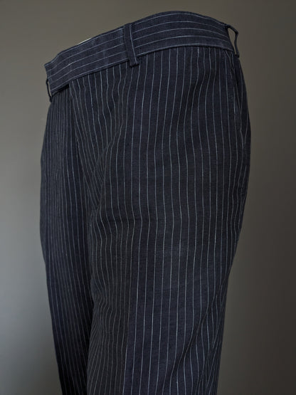 Pantalon en lin Hugo Boss. Rayé bleu et blanc. Taille 52 / L