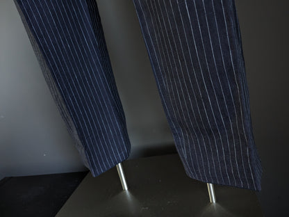 Pantalon en lin Hugo Boss. Rayé bleu et blanc. Taille 52 / L