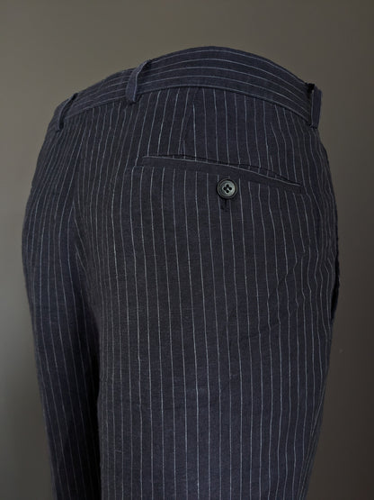 Pantalon en lin Hugo Boss. Rayé bleu et blanc. Taille 52 / L