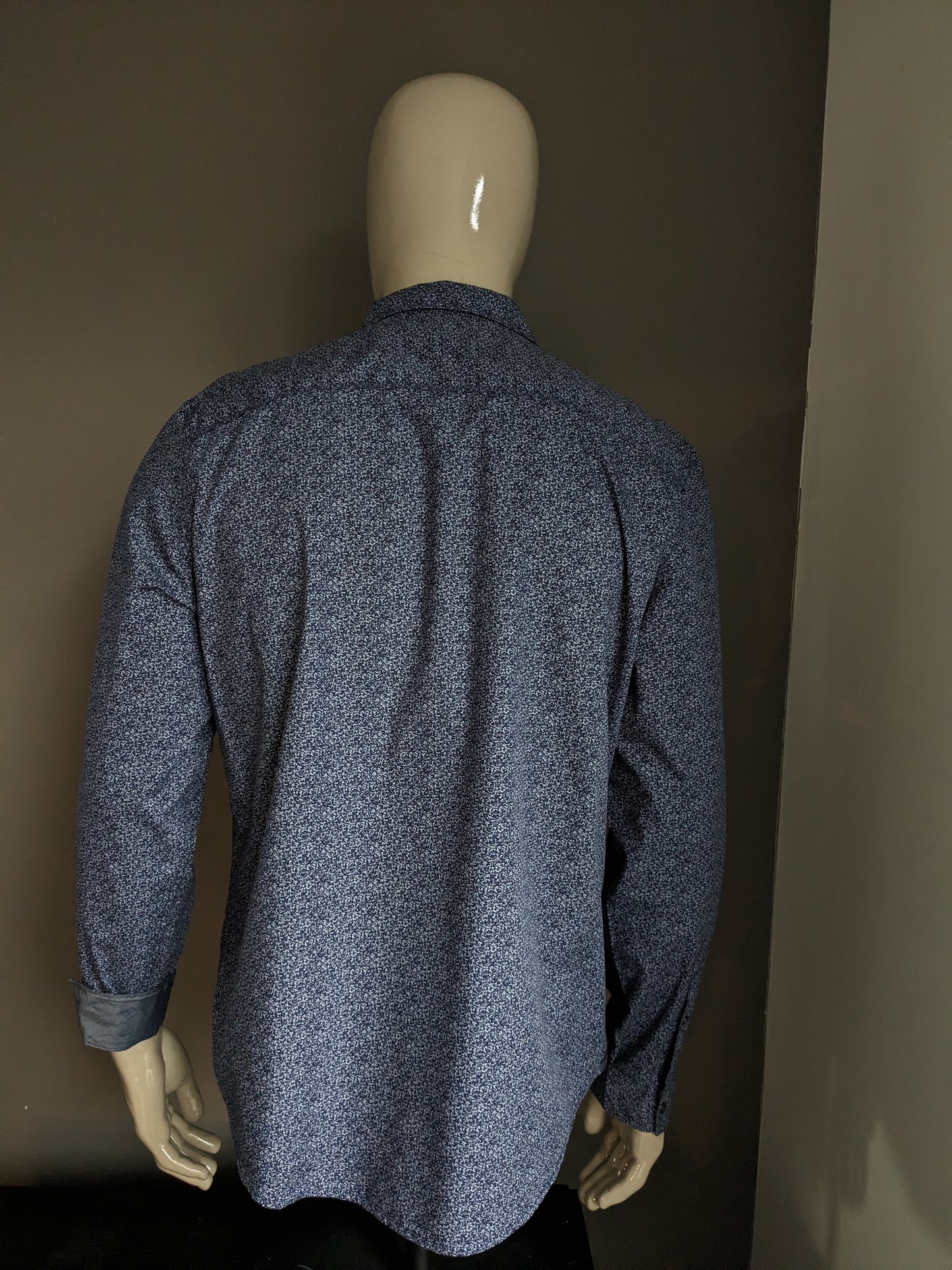 Chemise Calvin Klein. Impression bleue. Taille L.