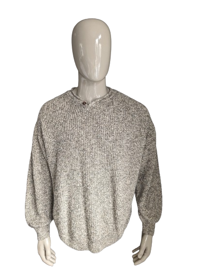 Suéter vintage de moda del hombre. Beige gris mezclado. Tamaño L / XL Modelo de gran tamaño vintage.