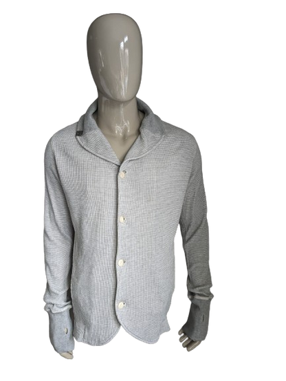 Cardigan Diesel avec col et boutons. Gris mélangé avec trous pour les pouces dans la manche. Taille L.