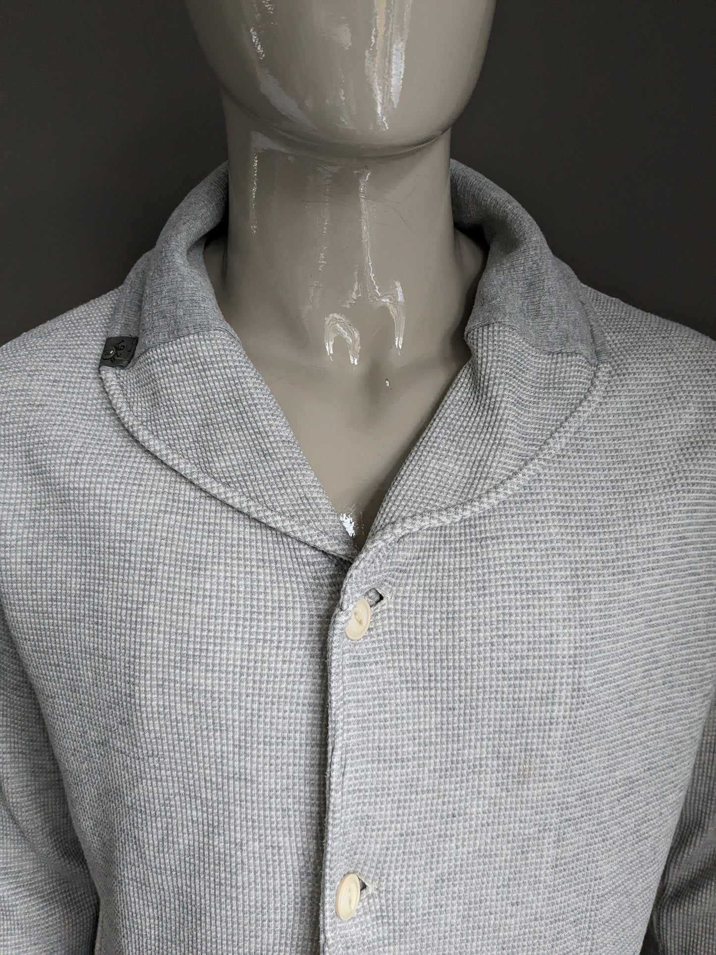 Cardigan Diesel avec col et boutons. Gris mélangé avec trous pour les pouces dans la manche. Taille L.