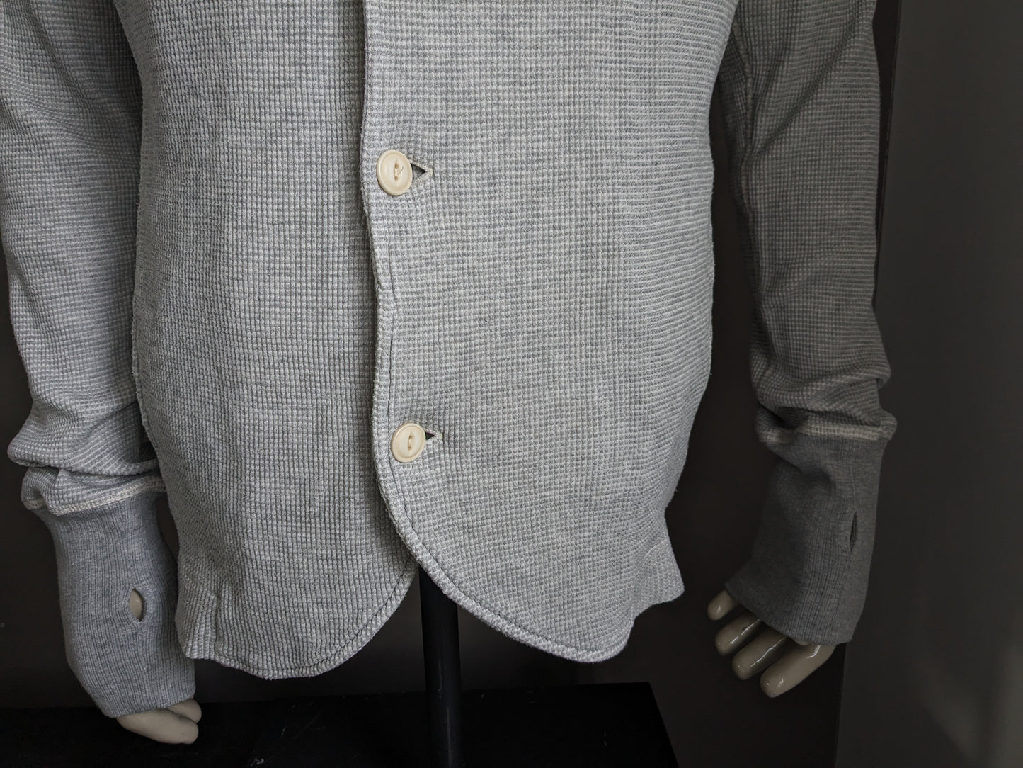 Diesel cardigan with collar and buttons. Gray mixed with thumb holes in sleeve. Size L.