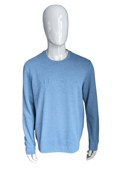 Pull décontracté Ted Baker. Motif chevrons bleus. Taille XL.
