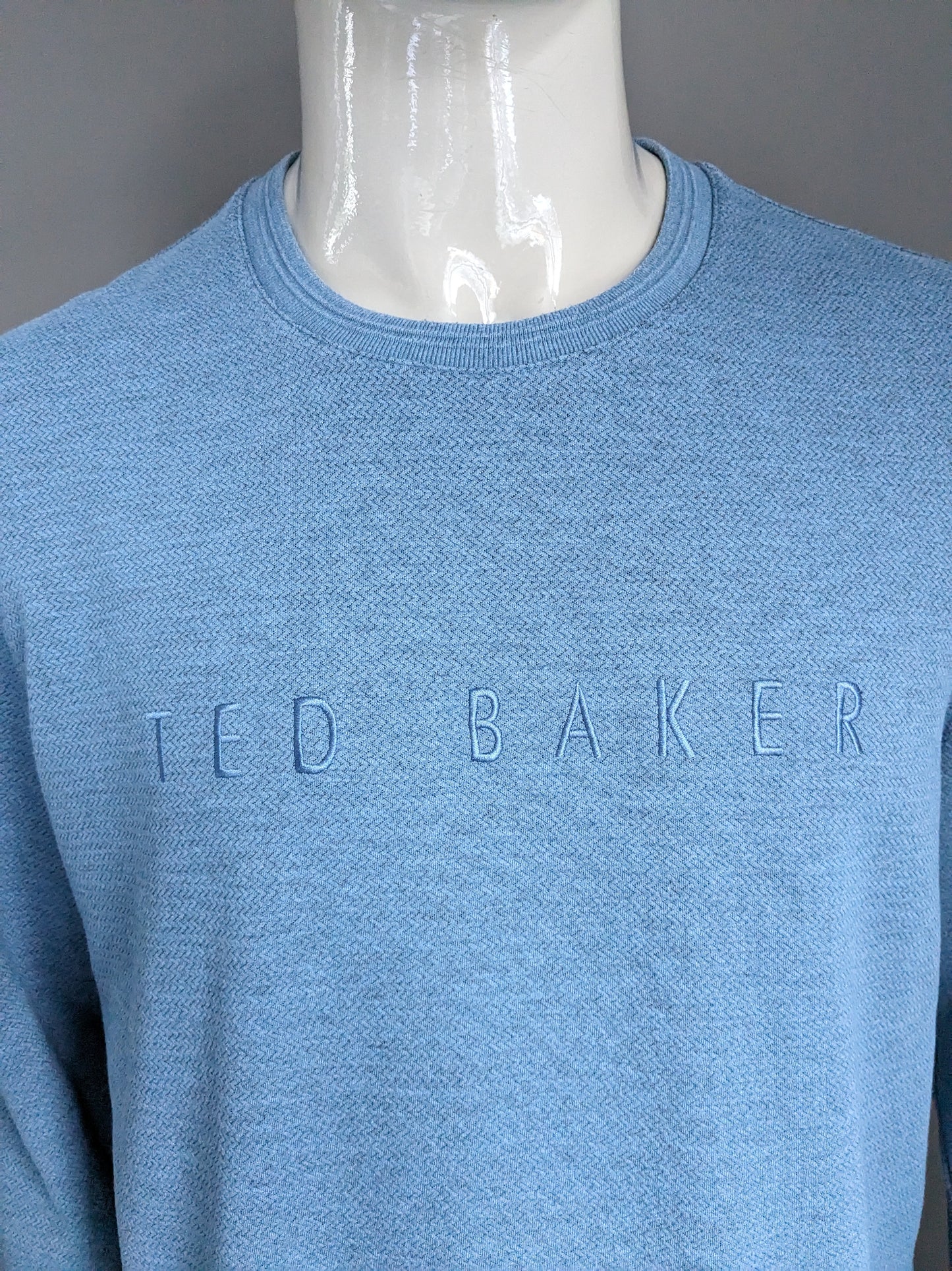 Pull décontracté Ted Baker. Motif chevrons bleus. Taille XL.