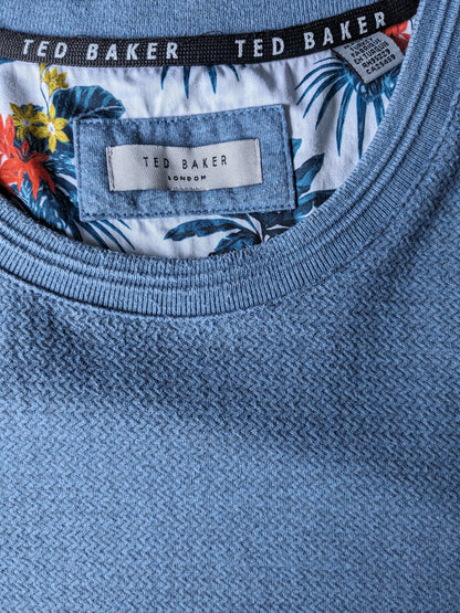 Pull décontracté Ted Baker. Motif chevrons bleus. Taille XL.