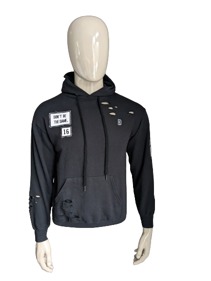 BLVCKDOPE Hoodie. Black with decorative holes and applications. Size S.
