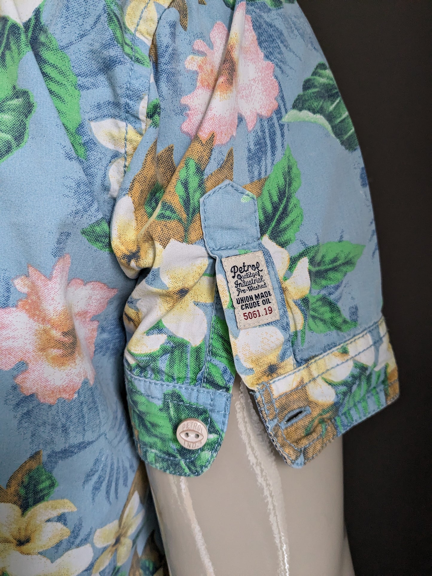 Petrol Hawaii shirt short sleeve. Blue green yellow pink floral print. Size L.