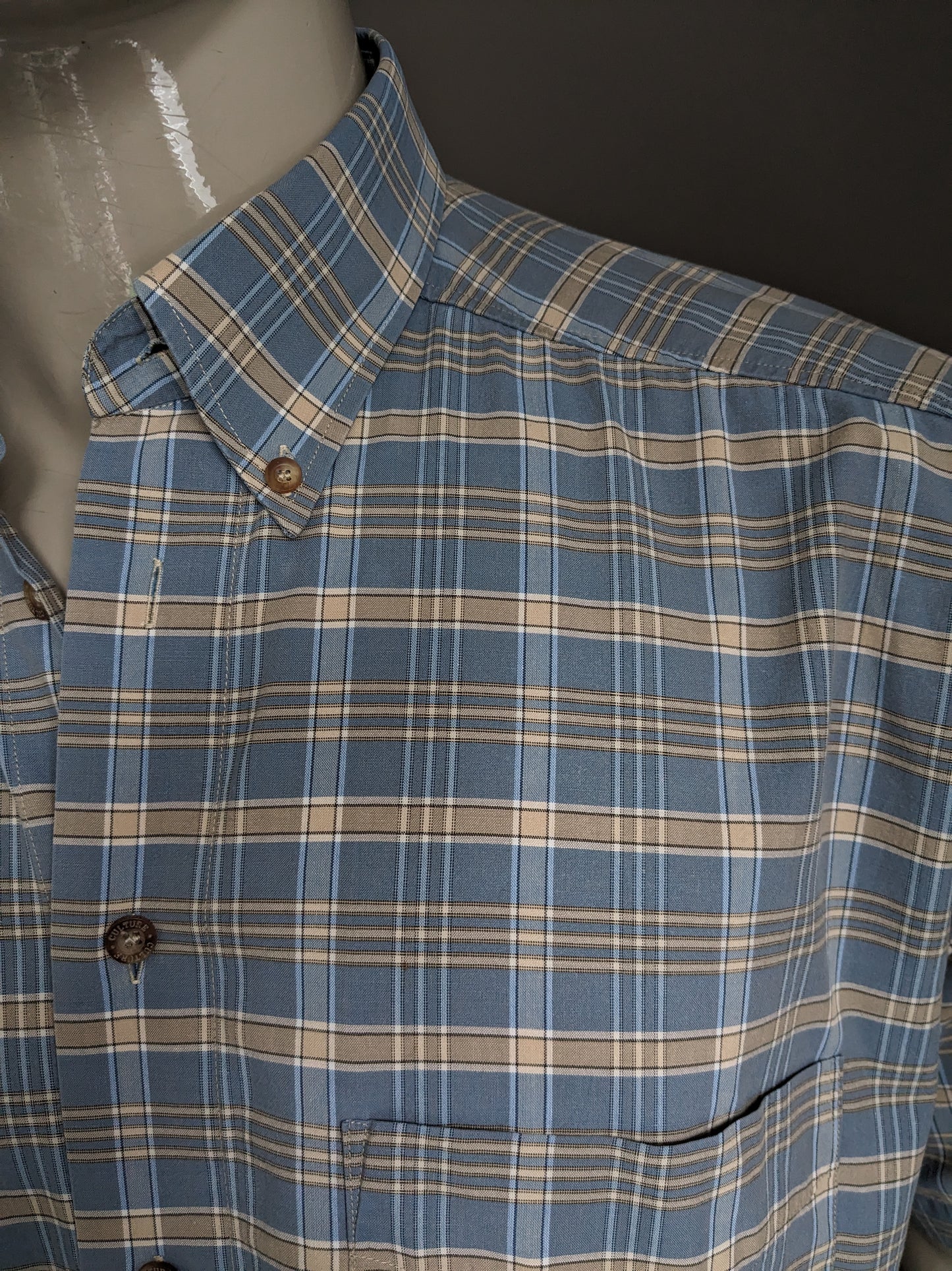 Camisa deportiva de cultura vintage manga corta. Verificador de color beige azul. Tamaño L / XL.