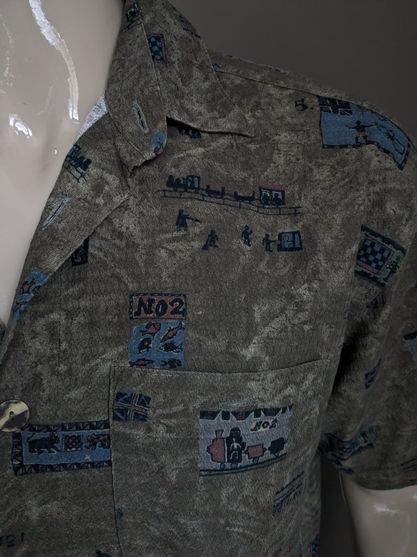 Vintage Signum Hemd kurzarm. Größere Tasten. Braungrün-blauer Druck. Größe XL.