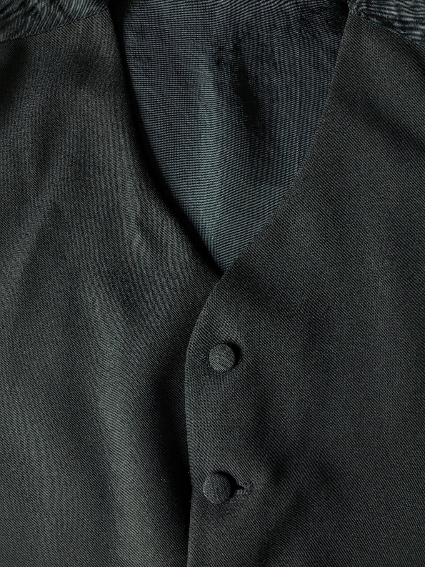 Gilet con botones tapizados. Color negro. Tamaño M. #337.