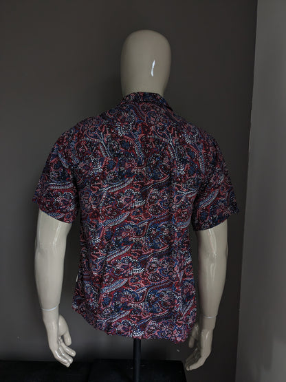 Rebel print overhemd korte mouw. Rood blauw zwarte print. Maat S / M.